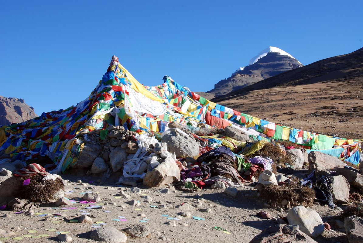 04 Mount Kailash Pokes Above Mount Ashtapad From First Prostration Point Chaktsel Gang On Mount Kailash Outer Kora Mount Kailash pokes above Mount Ashtapad with the first prostration point (Chaktsel Gang), reached in an hour from Darchen (07:41).